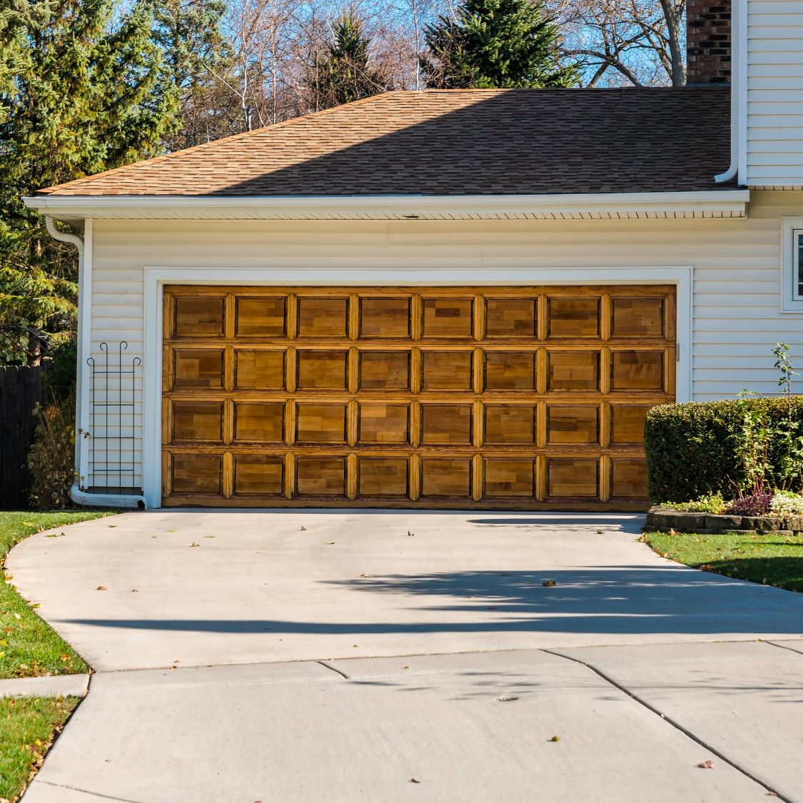 3 Ways To Tell if Your Wooden Garage Door Is in Danger