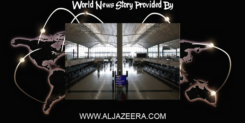 World News: Hong Kong suspends transit flights to most of world over Omicron - Al Jazeera English